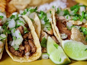 Sumptuous freshly prepared taco dish with lime
